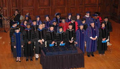 Graduates and Faculty on Stage