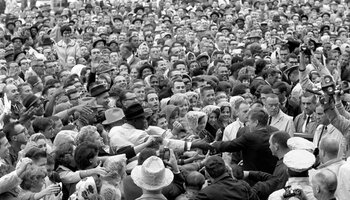image of JFK in a crowd