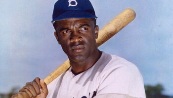 Jackie Robinson holding a bat