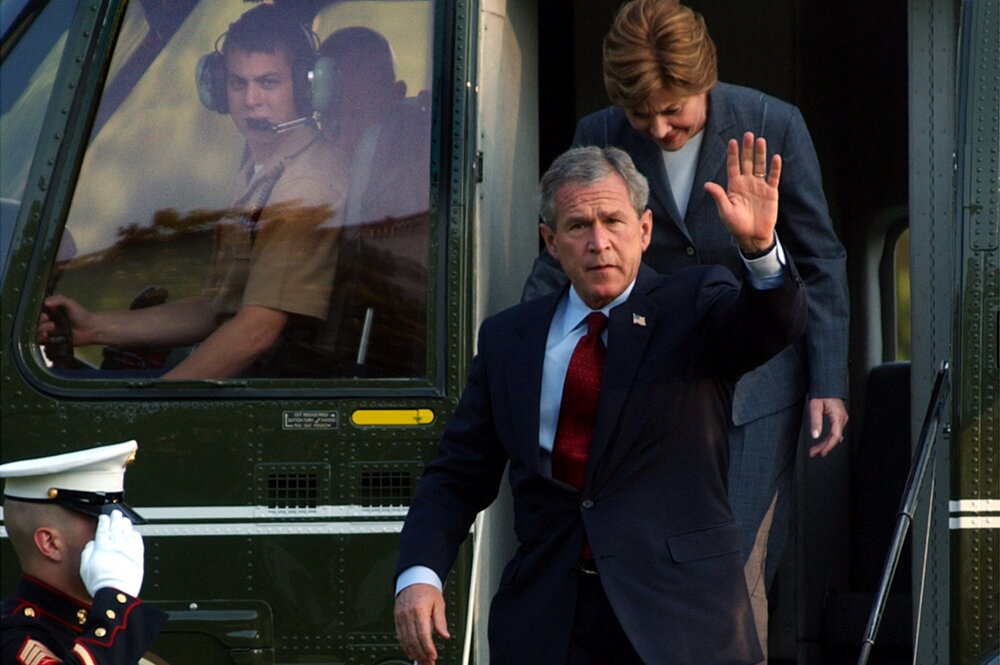 Bradley Harms in the cockpit of the presidential helicopter. President Bush and First Lady Laura Bush exit the helicopter.