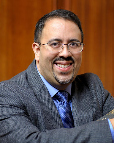 Professor Adrian Burgos