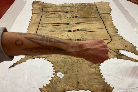 George Ironstrack, a Miami Tribe citizen and part of the Reclaiming Stories project, shows his tattoo that is based on a robe's imagery.  Photo courtesy Robert Morrissey