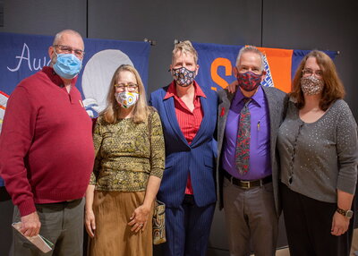 Members of the AIDS quilt exhibit team include Kathy Oberdeck (second from left), Jerry Carden (second from right), Beth Watkins (far right)