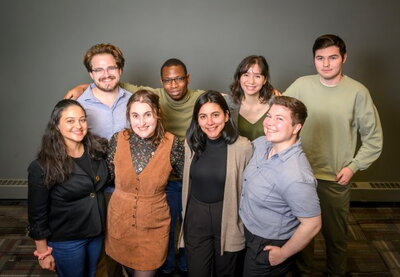 graduate student organizers stand in a group.