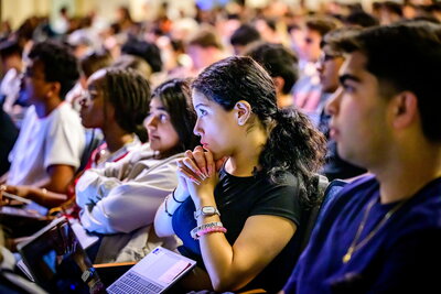 Students sit in a lecture hall for a data science class.
