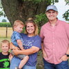 Dale Mize with Erin Crider and her children at Crider Farms, a family farm in Farmer City