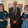 Shannon Croft and Michelle Tomaszycki pose with their awards with Dean Wojtek Chodzko-Zajko