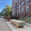 Memorial bench outside of Gregory Hall