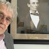 Jim Barrett with a photo of Abraham Lincoln