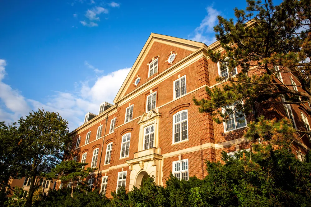 Gregory Hall on a sunny day.