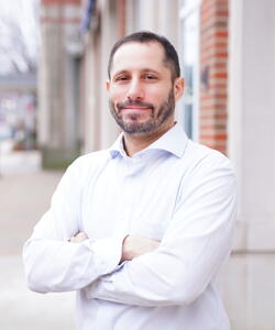 Marc Hertzman standing outside