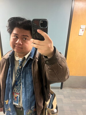 Travis in a mirror selfie