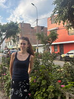 Woman standing on city street