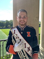 Colin holds an instrument