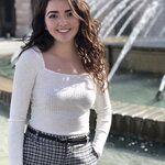 Carmen, next to a fountain in Pavia, IT 